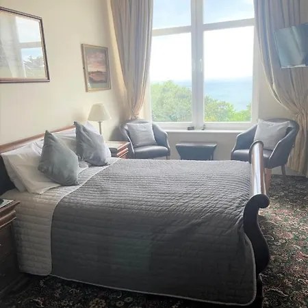 Family bedroom with sea glimpse
